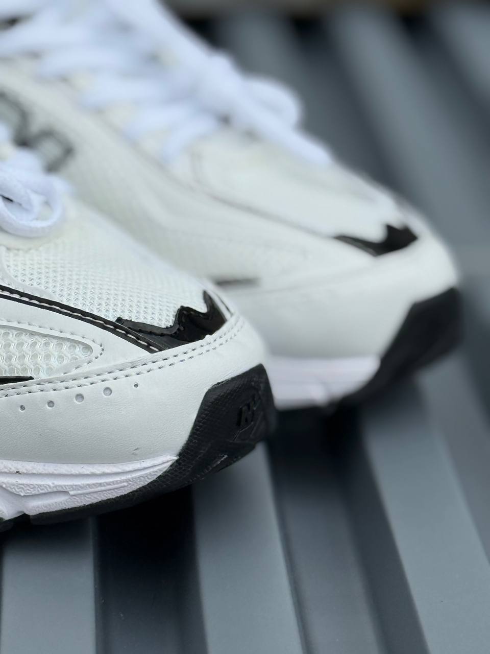 New Balance 509 blanca negra
