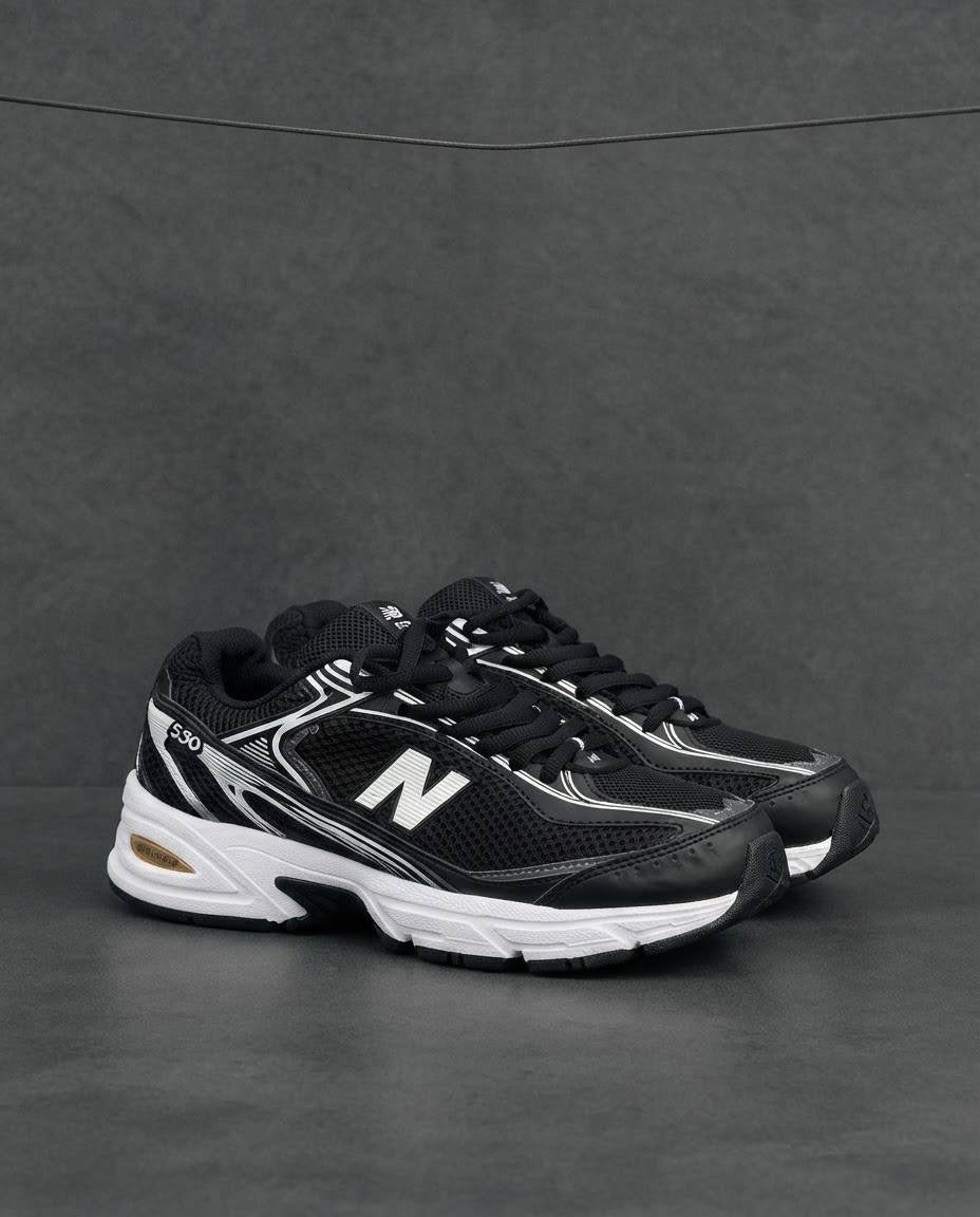 New Balance 509 negra blanca