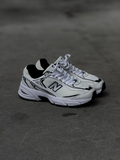 New Balance 509 blanca negra