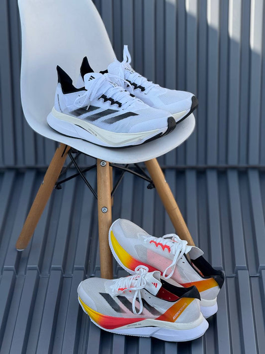 Adizero negra y naranja