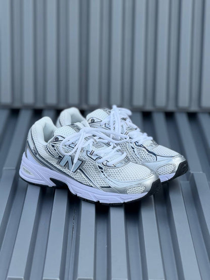 New Balance 740 blanca azul
