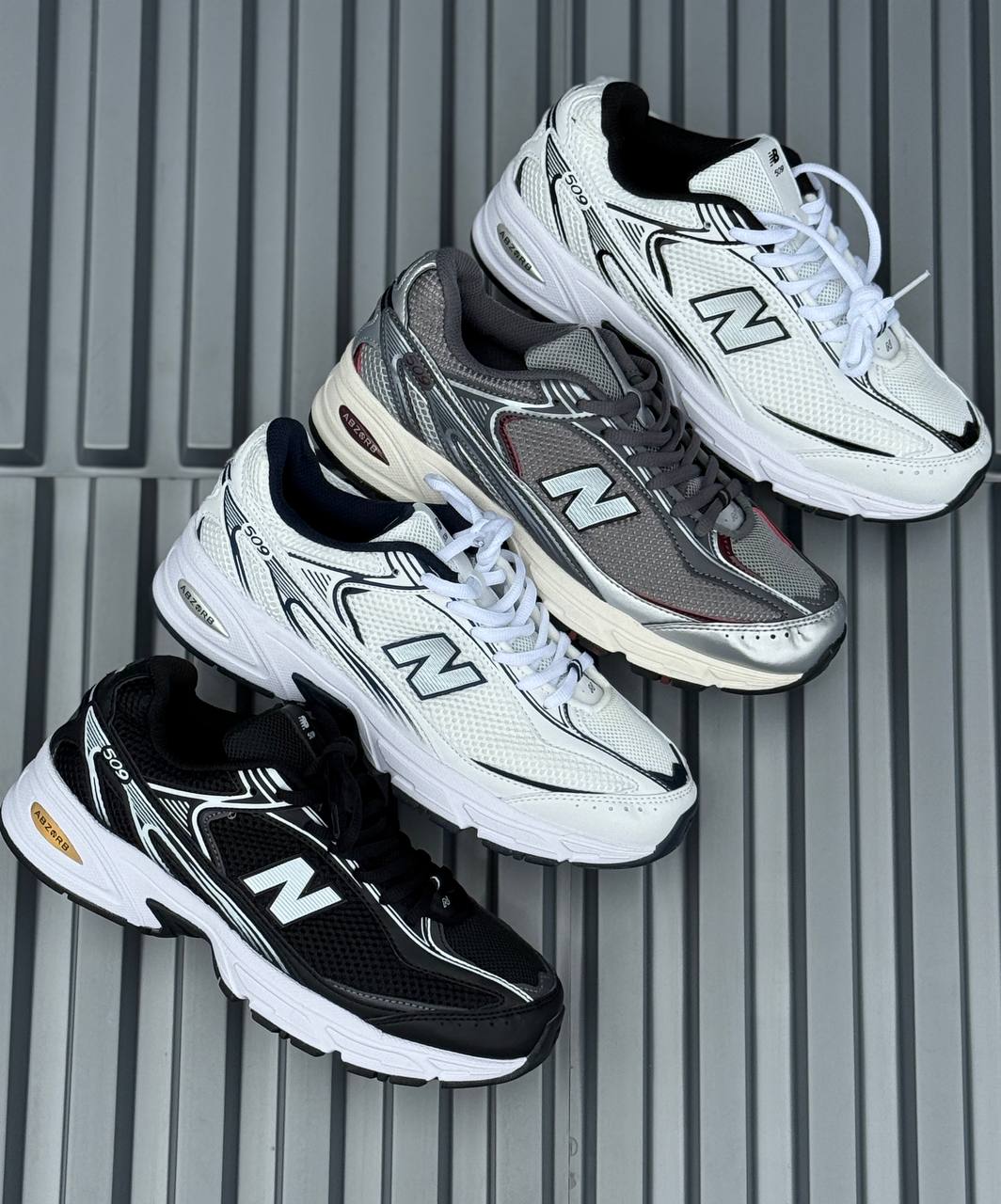 New Balance 509 blanca negra
