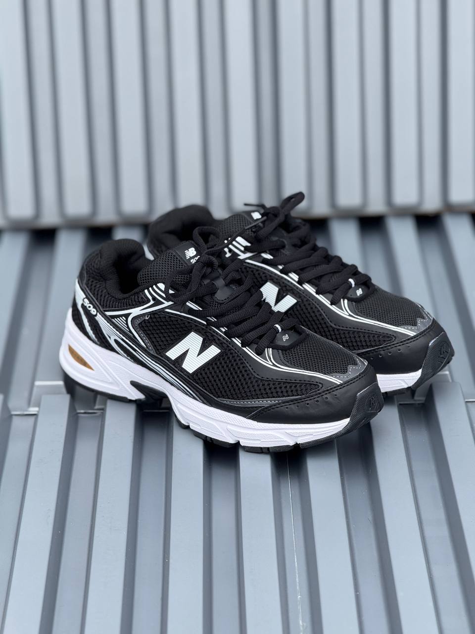 New Balance 509 negra blanca