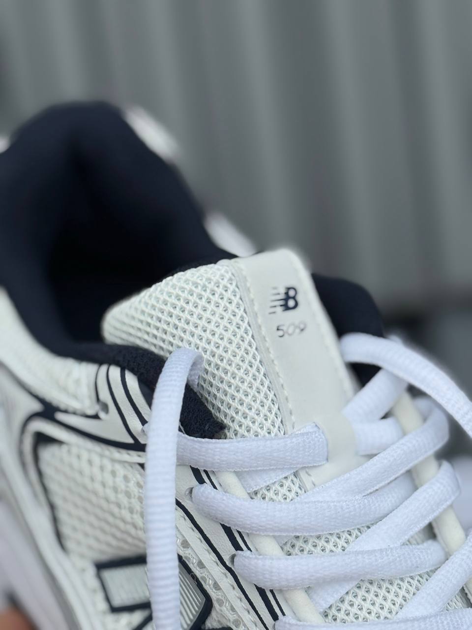 New Balance 509 blanca azul