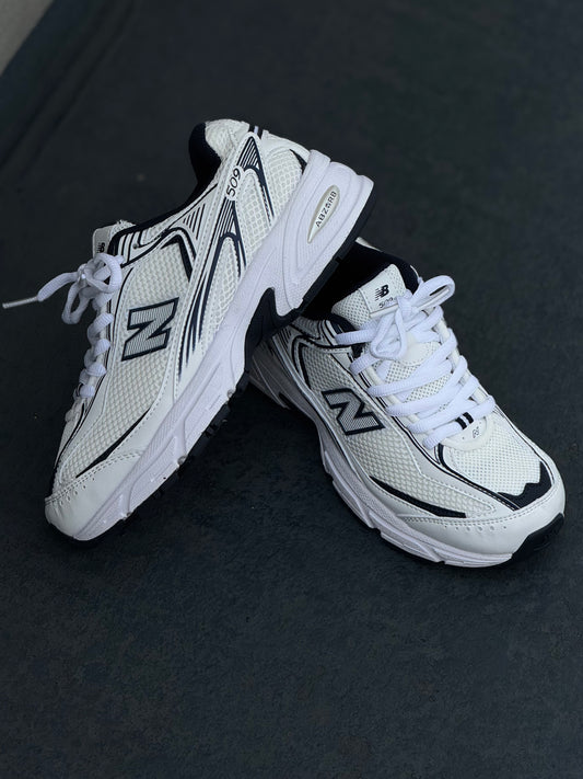 New Balance 509 blanca azul