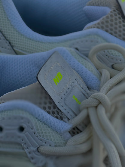 New Balance 1906A in a white and green colorway.