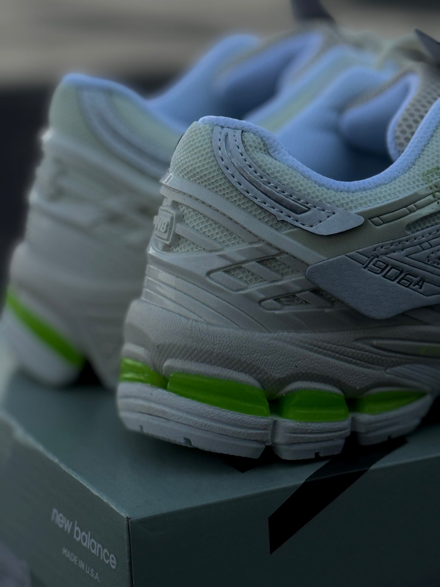 New Balance 1906A in a white and green colorway.
