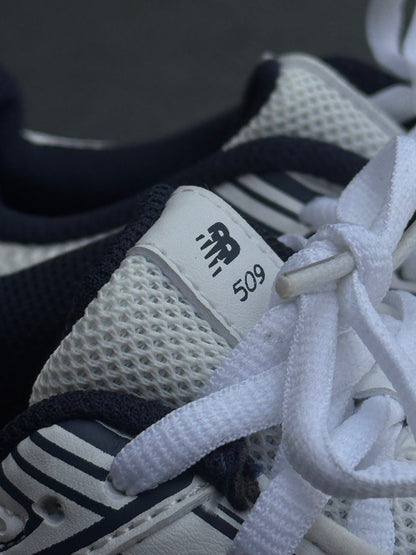 New Balance 509 blanca azul