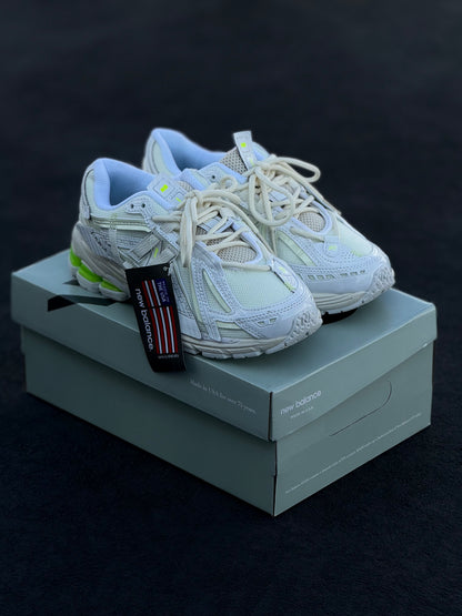 New Balance 1906A in a white and green colorway.