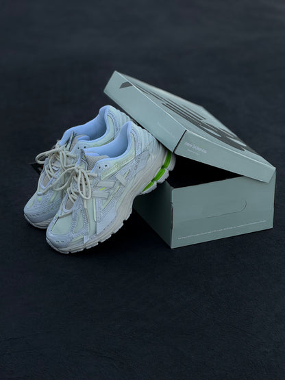 New Balance 1906A in a white and green colorway.