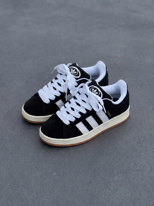 Adidas Campus negra blanca suela en goma