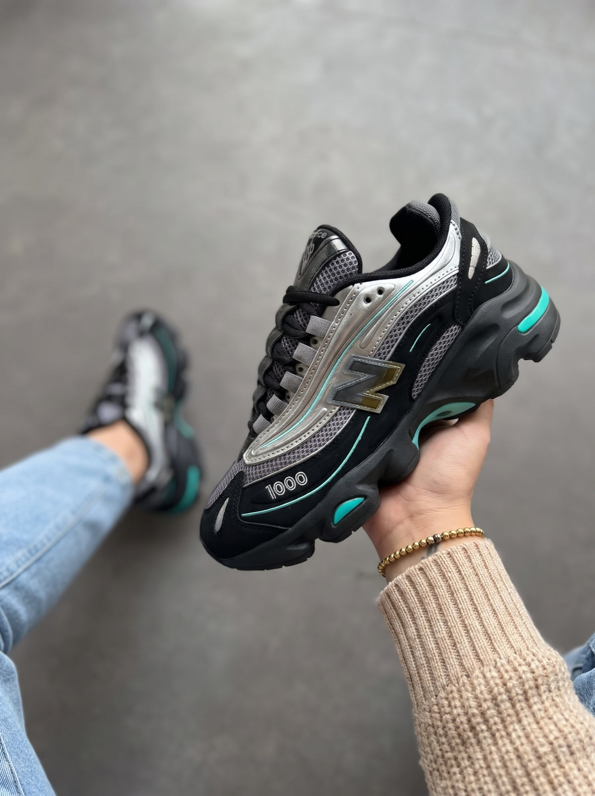 New Balance 1000 Negra Plata Aguamarina