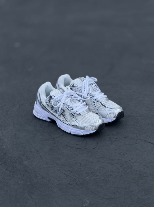 New Balance 740 blanca azul