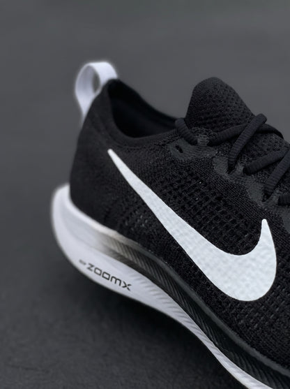 Nike Vomero Plus Negra Blanca