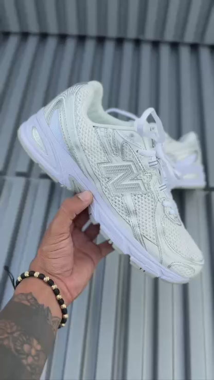 New Balance 740 blanca gris