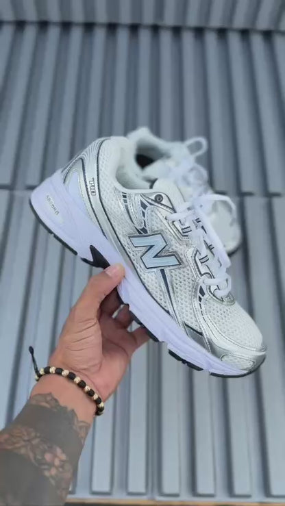 New Balance 740 blanca azul